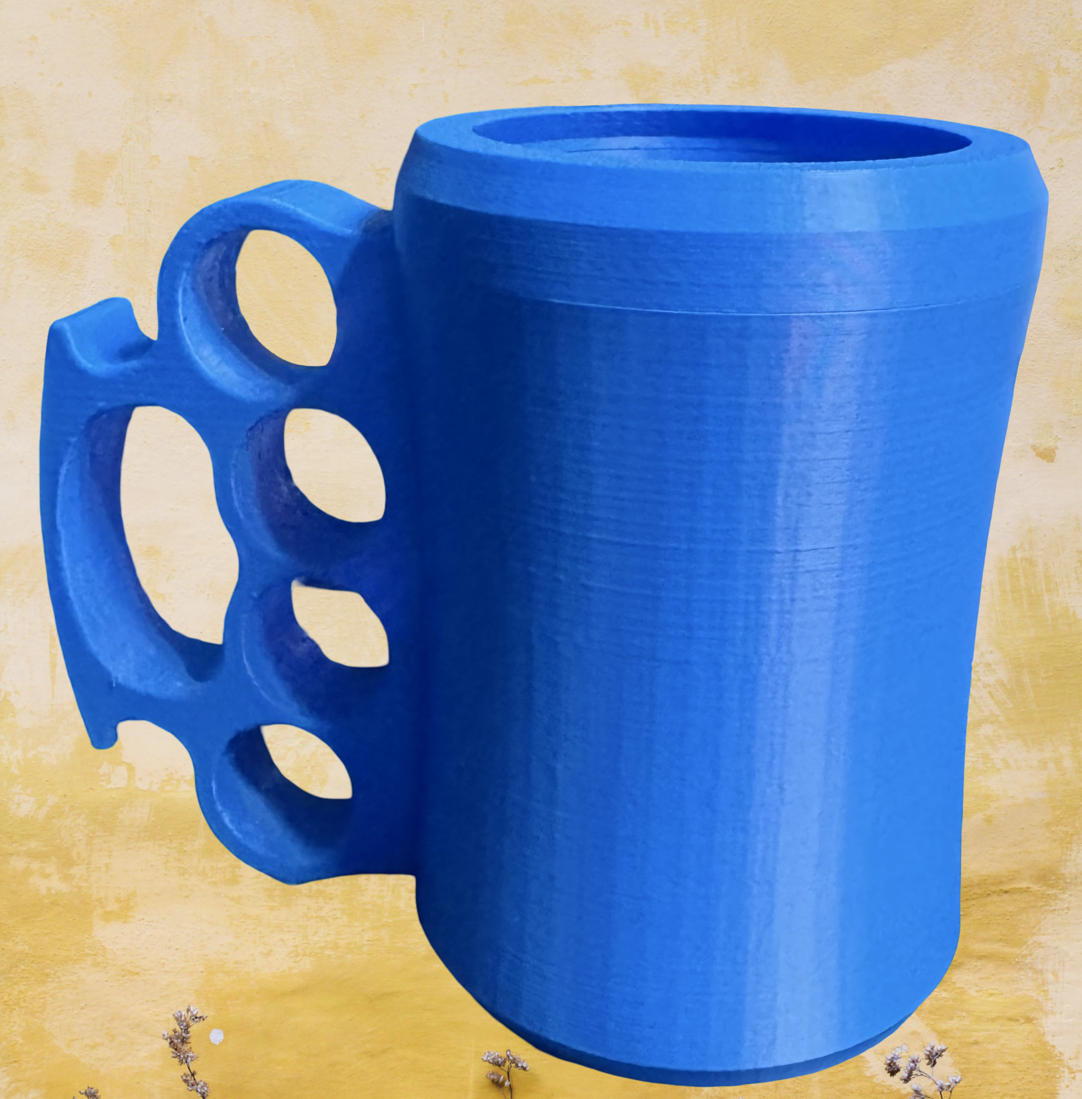 Brass knuckles koozie with a screw on lid ￼